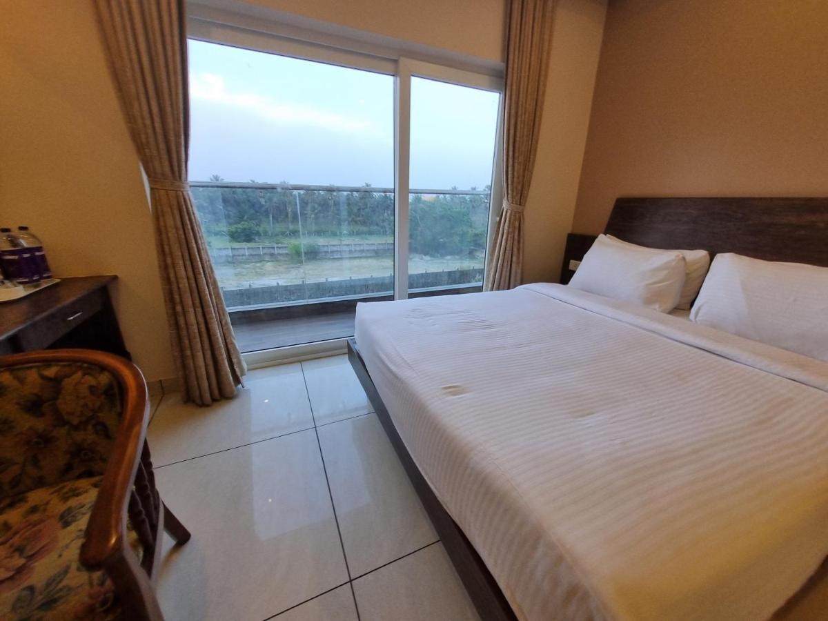Plutus Residency Hotel Auroville Buitenkant foto